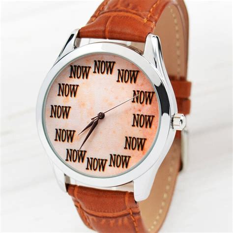 watch that says now|watch says now wrist.